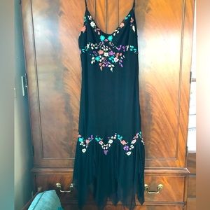 ICE size 8 black dress. Embroidery on lined netting.